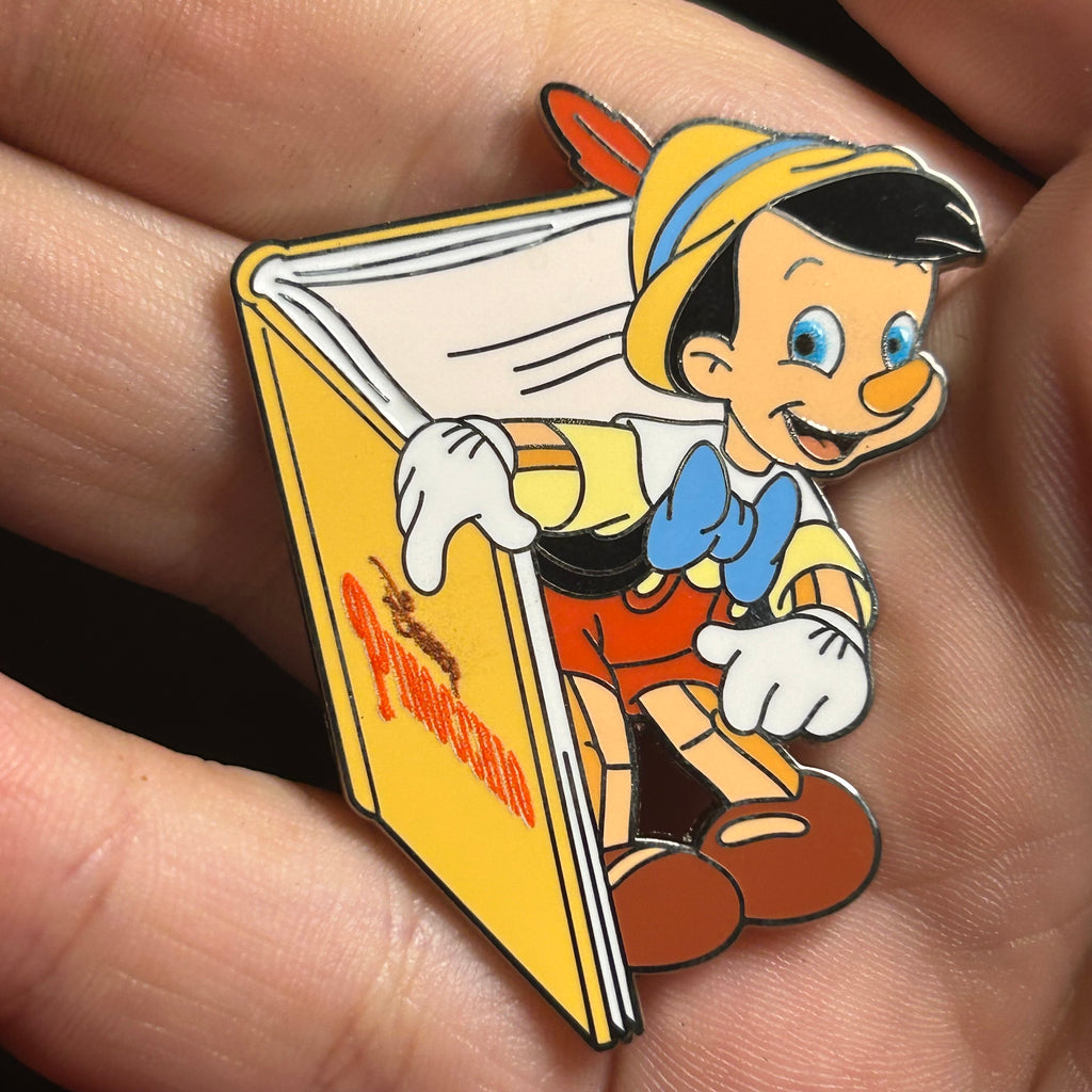 2025 - Pinocchio emerging from book - Disney Pin