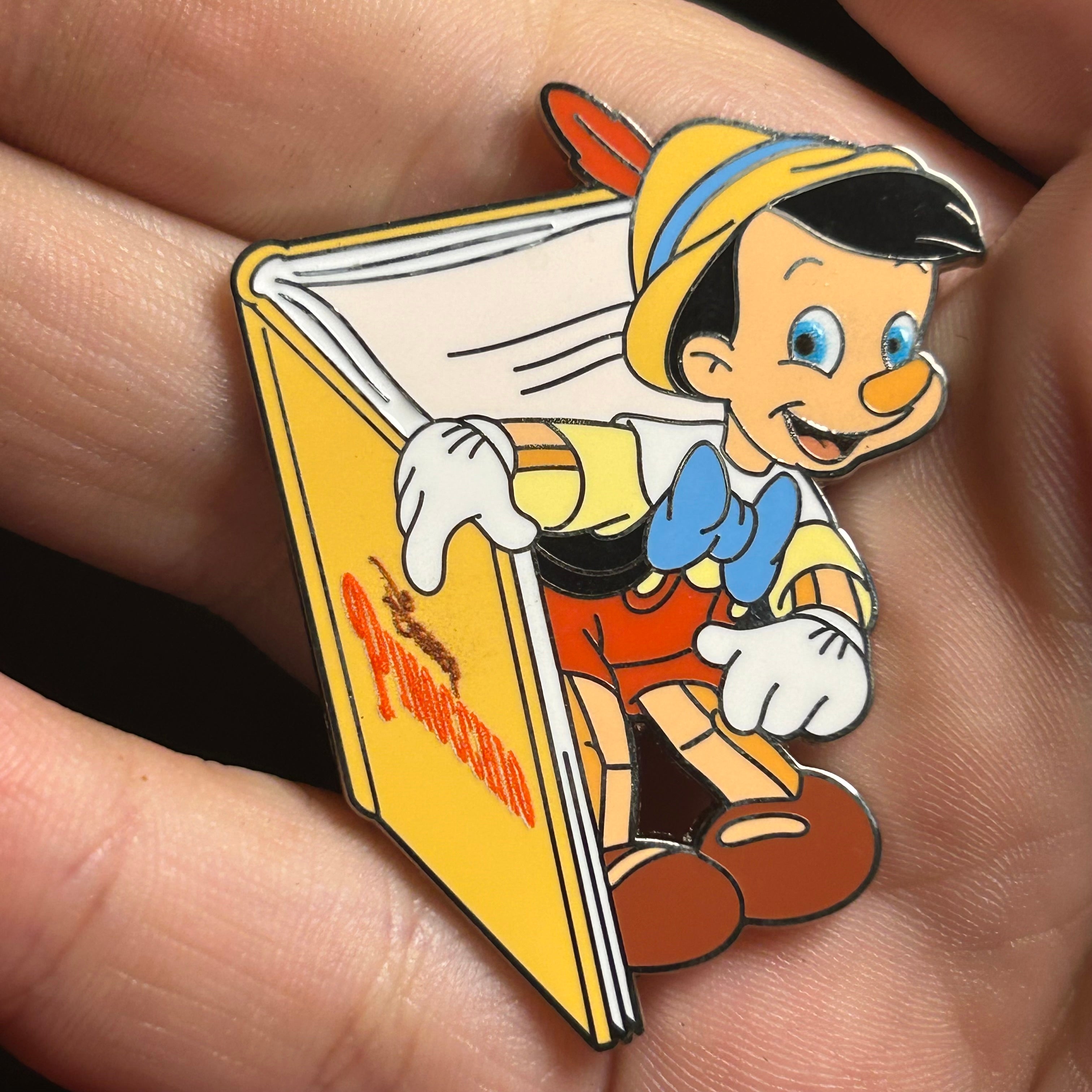 2025 - Pinocchio emerging from book - Disney Pin